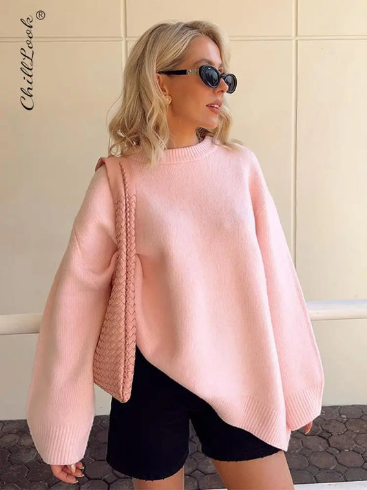 our Casual Pink O-neck Sweater for Women. Crafted with both style and comfort in mind, this sweater is the perfect addition to your wardrobe for any occasion.